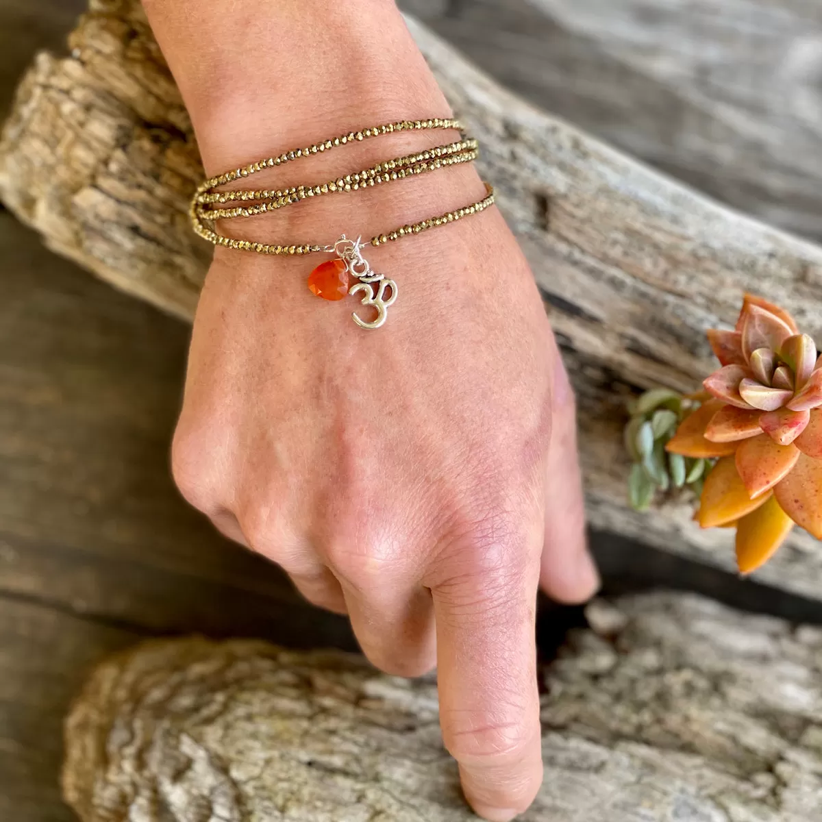 Protective Gold Crystal Wrap Bracelet with Ohm and Carnelian Quartz