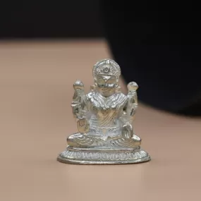 "Shining Symbol of Grace: The Silver Lakshmi Idol"